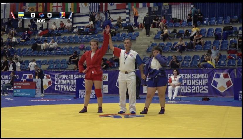 На зображенні може бути: ‎текст «‎BINH 1:05 EAN ANS S 30 PIOM لا T EUROPEAN EUROPEANSAMBE AN SAMBI CHAMPION CYPRUS2 R EMROPO MROA CHЛM CYPP SHIP 02S PEANSAMBO PEAN SAMBO PIONSHIP RUS202S‎»‎